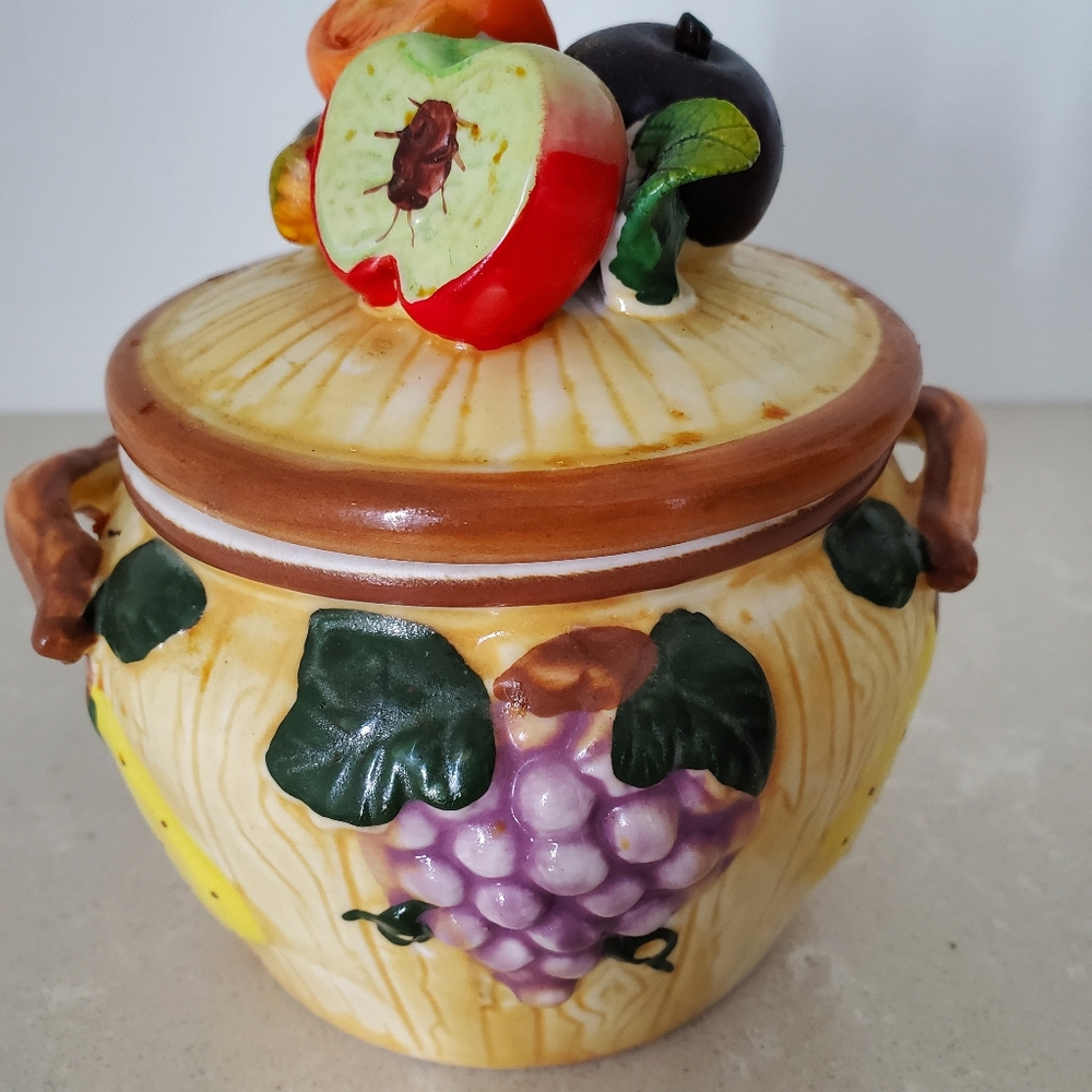 Vintage cookie/candy jar with raised fruits